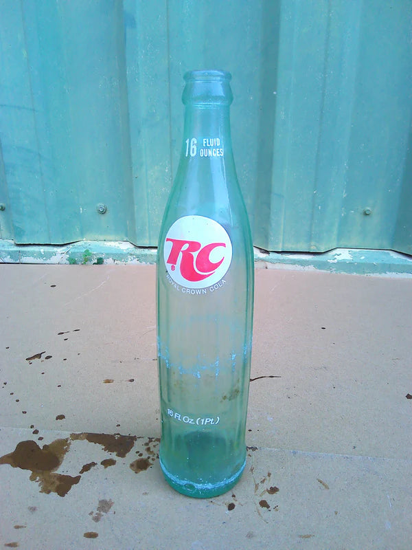 Individual assorted glass soda bottles