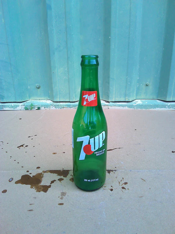 Individual assorted glass soda bottles
