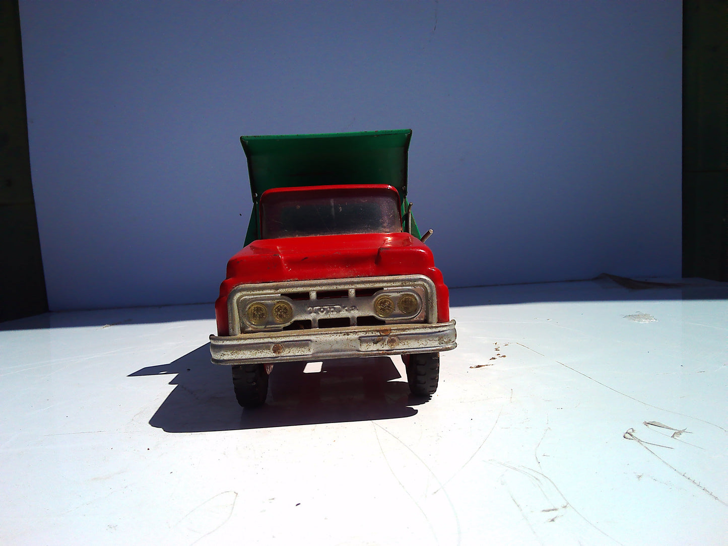 Vintage pressed metal Tonka dump truck toy