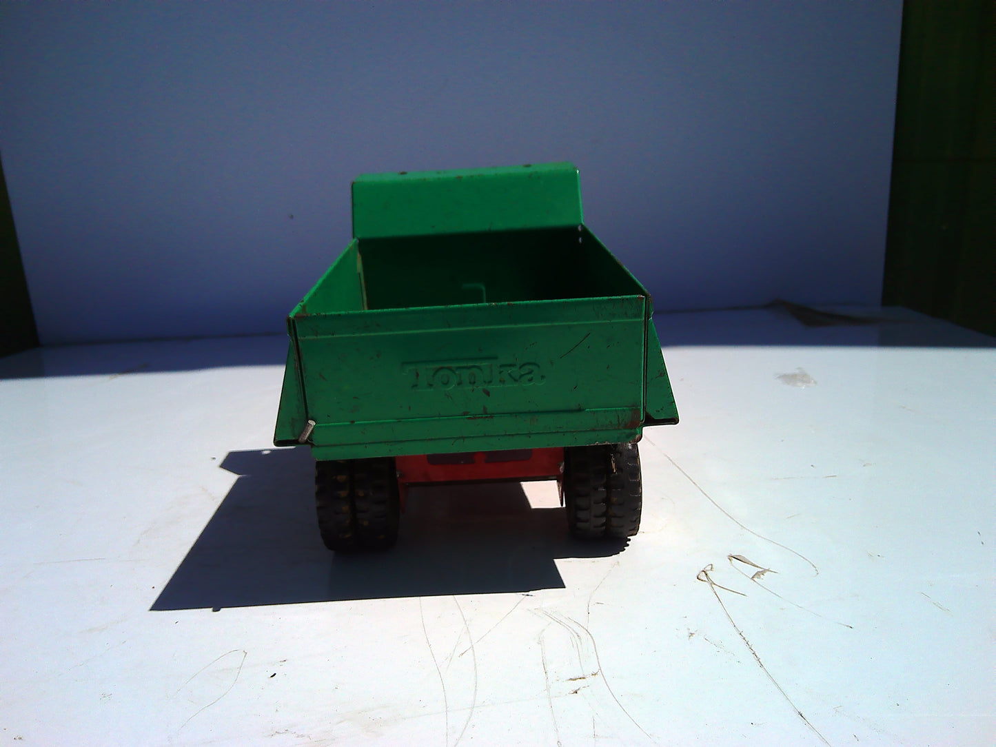 Vintage pressed metal Tonka dump truck toy