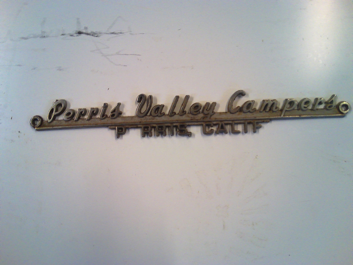Vintage metal Perris Valley Campers sign
