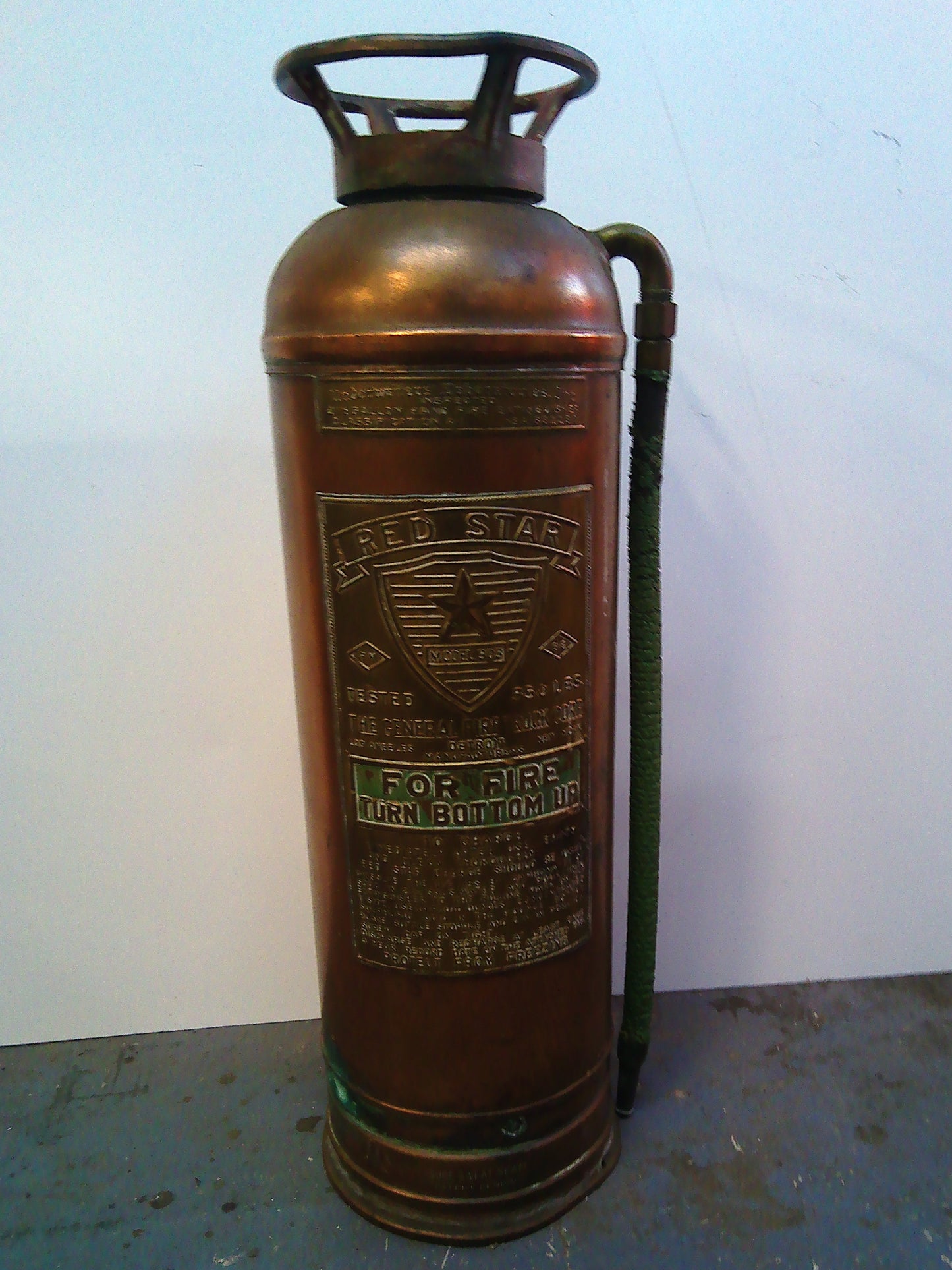 Vintage Red Star Model 303 copper and brass refillable fire extinguisher