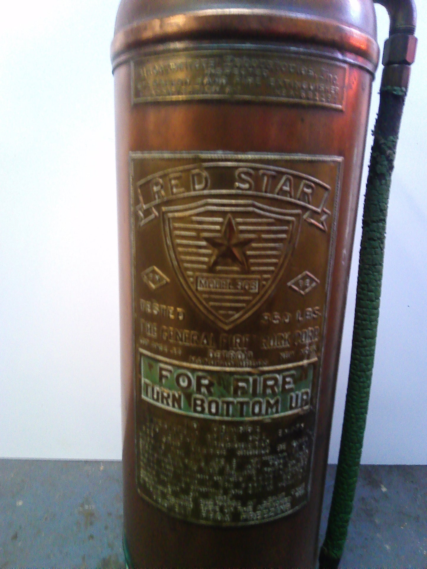 Vintage Red Star Model 303 copper and brass refillable fire extinguisher