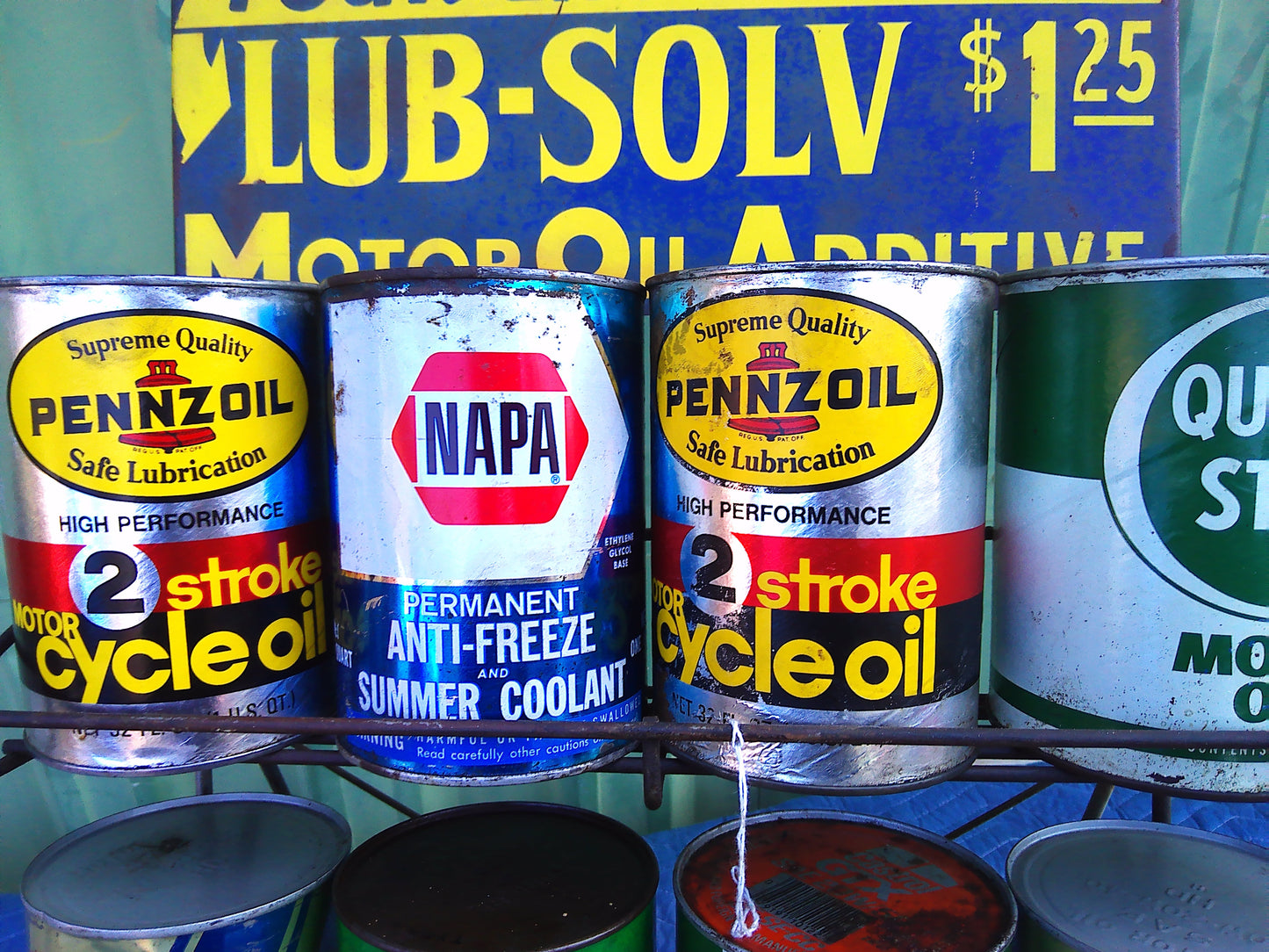 Lub-Solv rack with 12 assorted full/ empty 1 quart cans