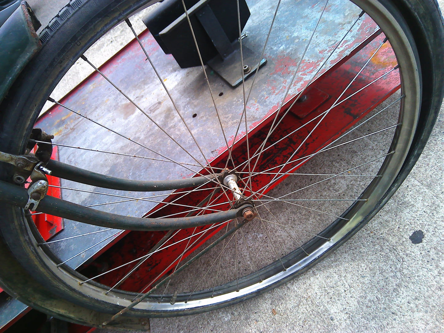 Vintage Raleigh bike with rear wheel dynamo and pouch