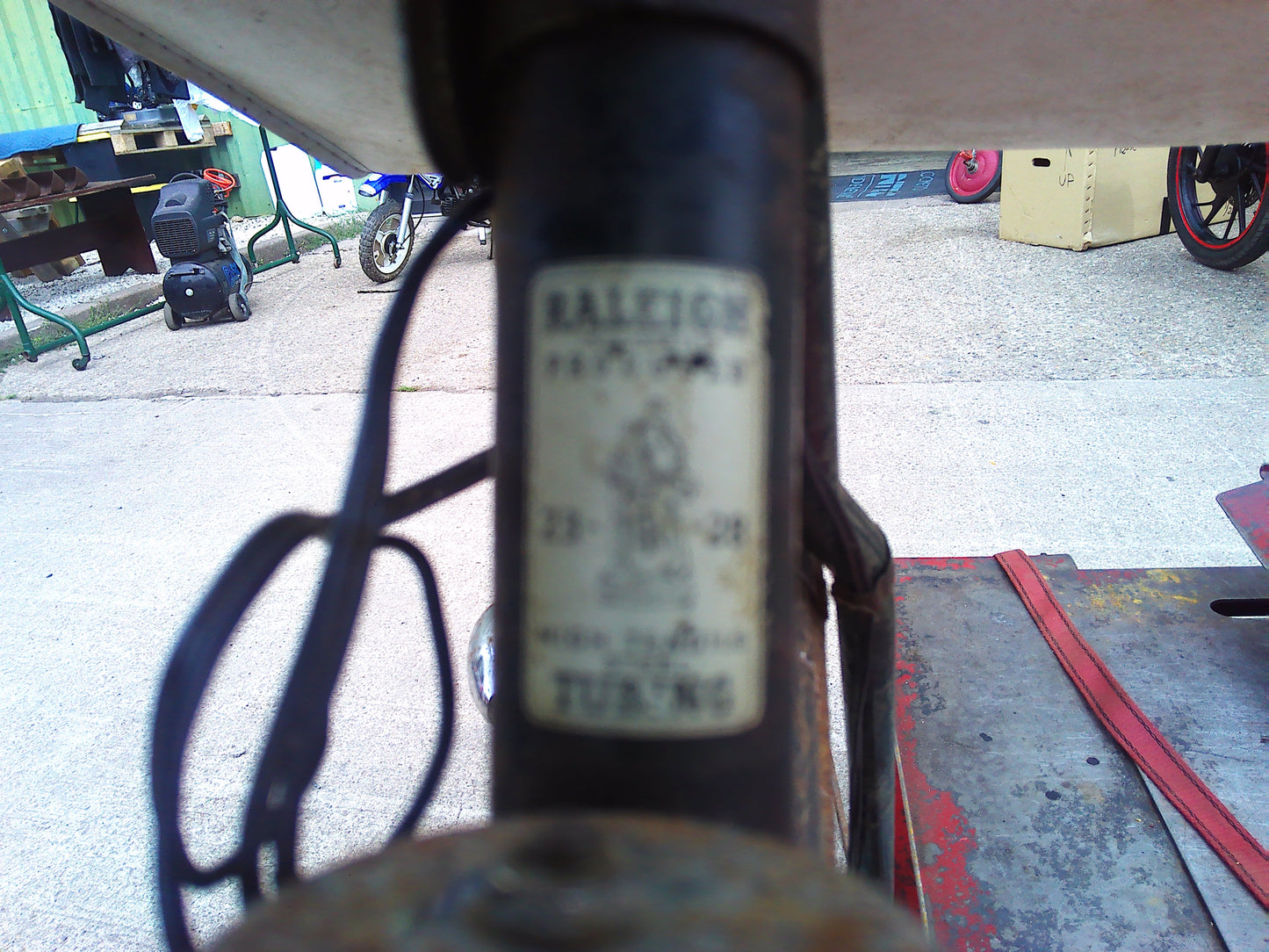 Vintage Raleigh bike with rear wheel dynamo and pouch