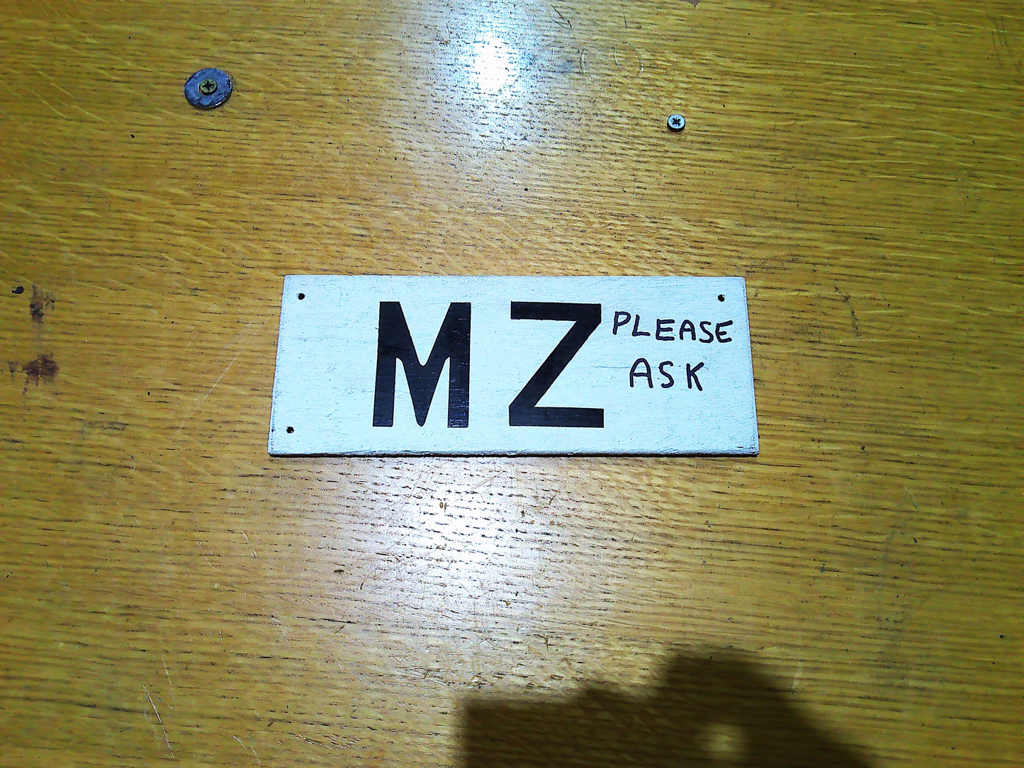 MZ 'please ask' wooden sign