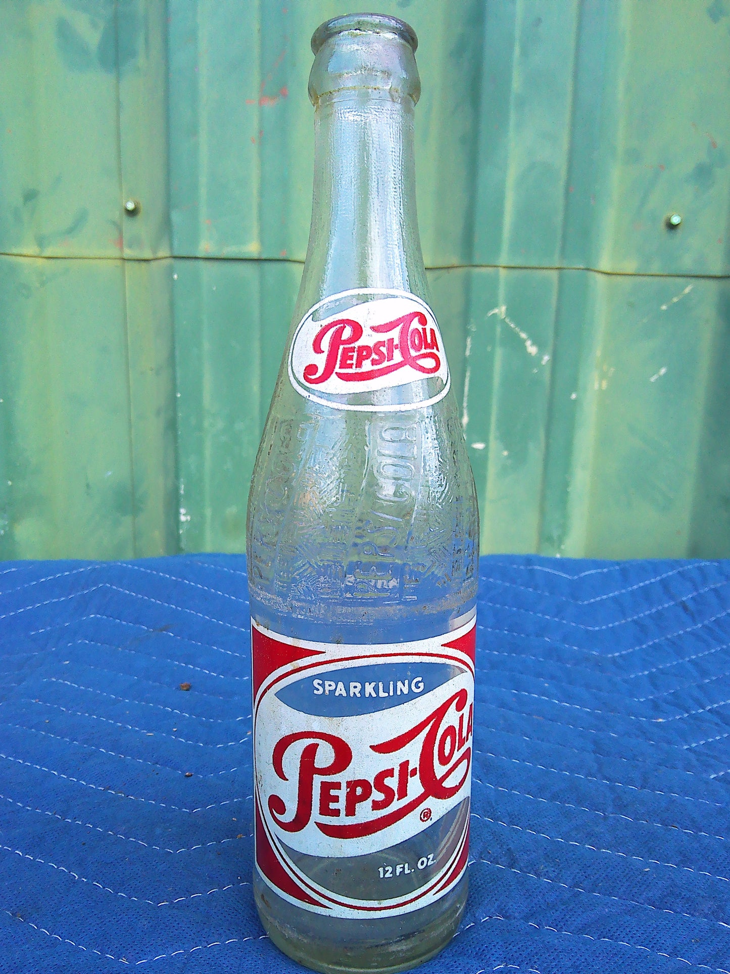 Individual assorted glass soda bottles