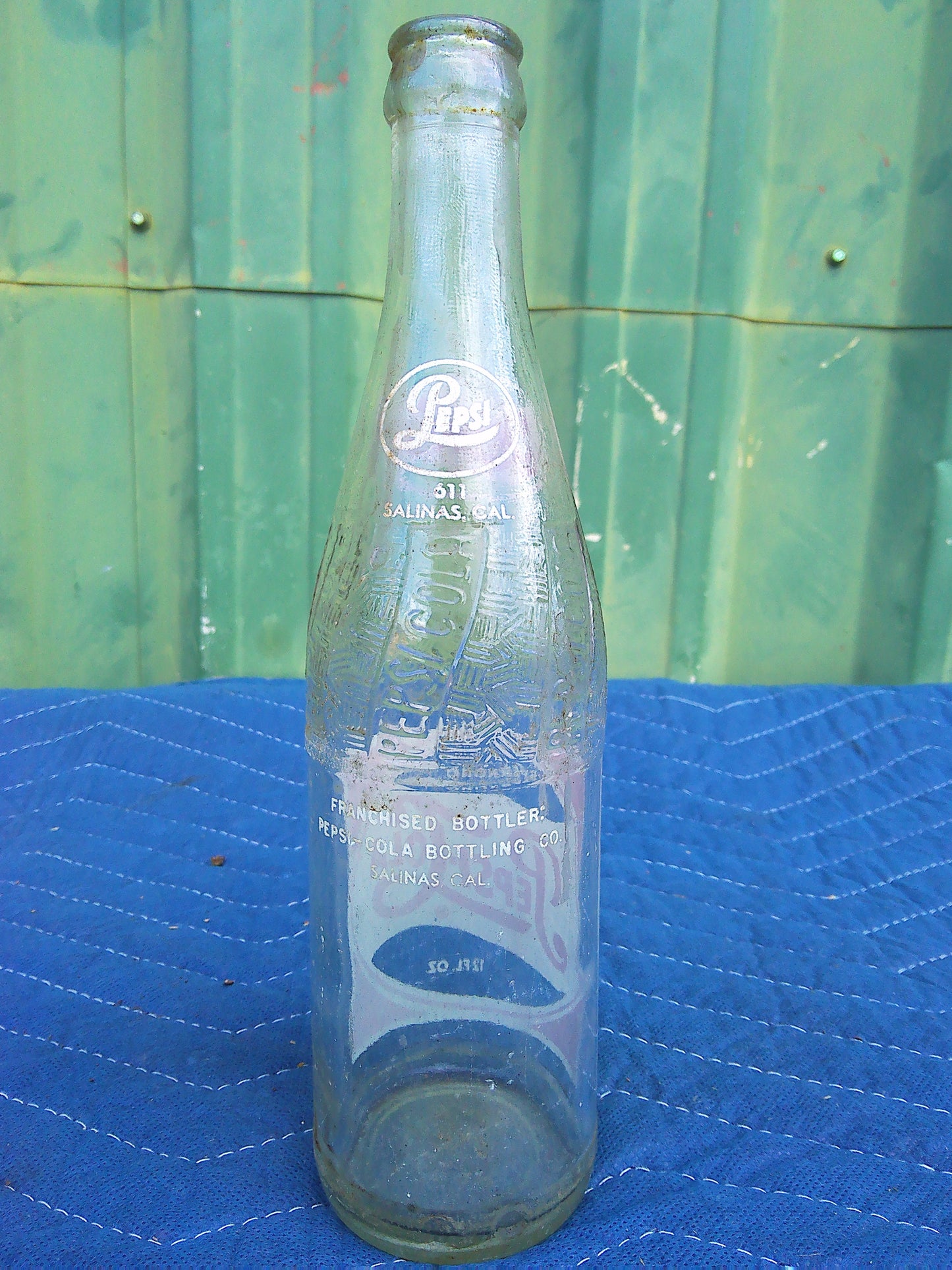 Individual assorted glass soda bottles