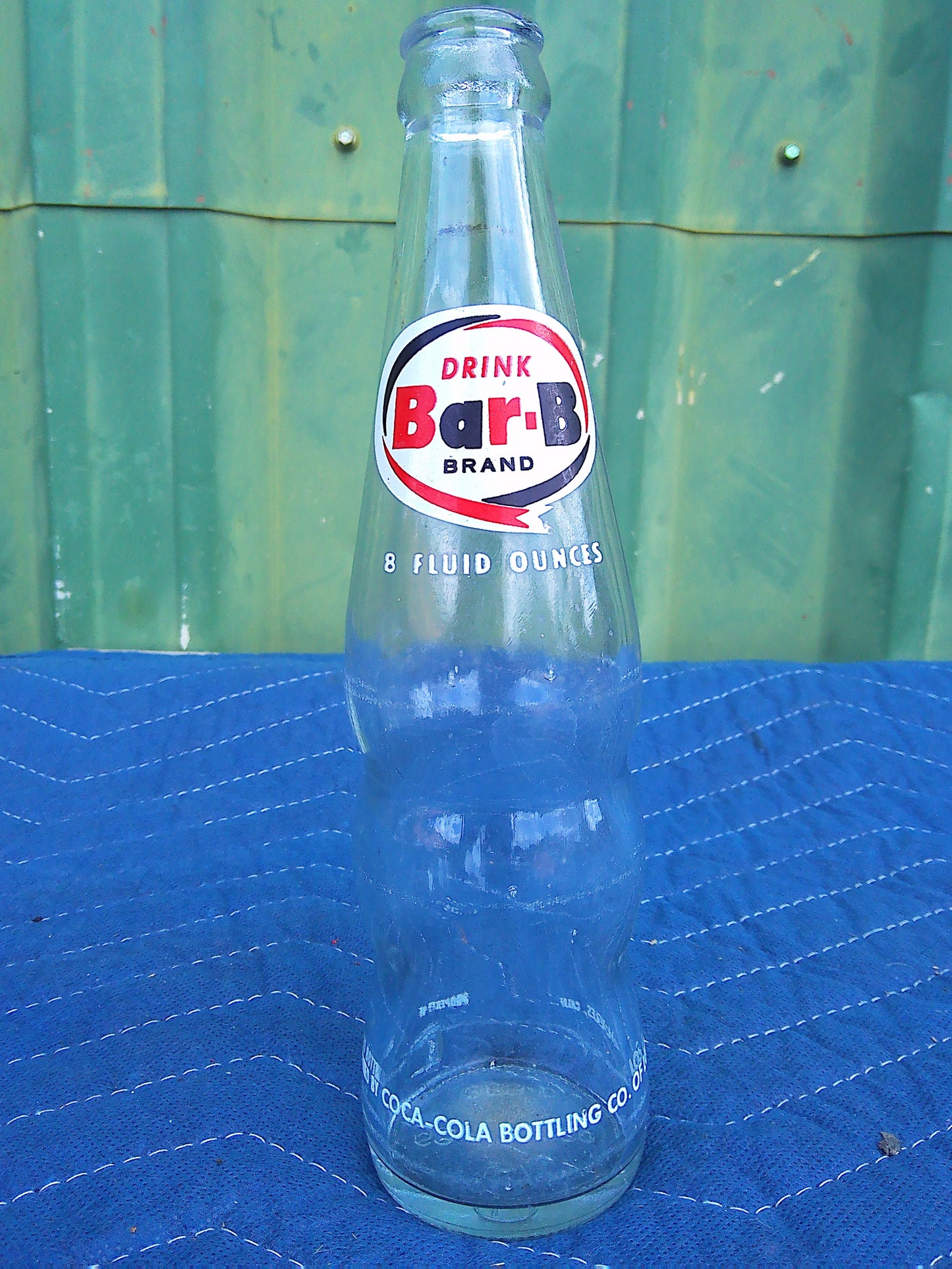 Individual assorted glass soda bottles