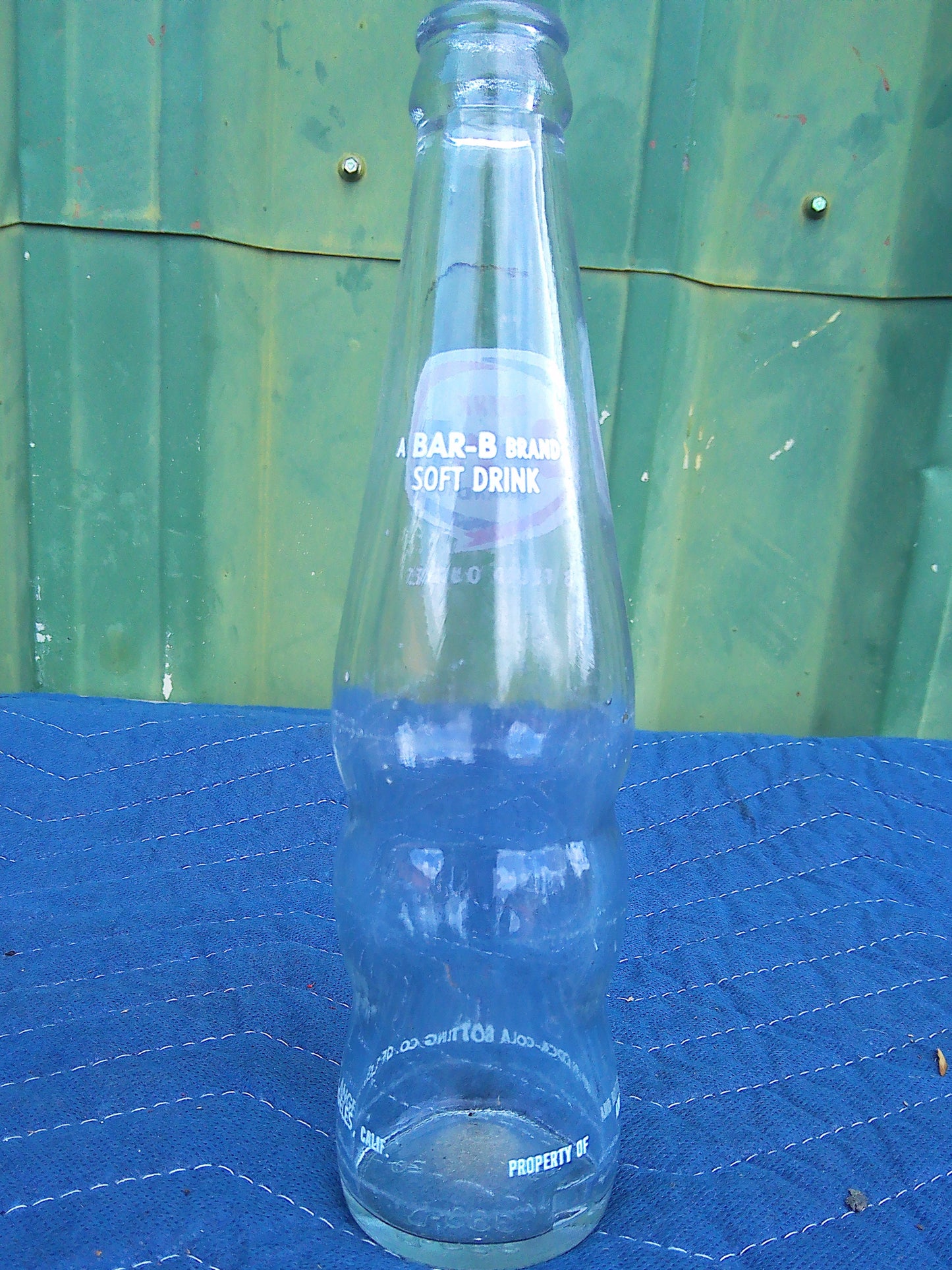 Individual assorted glass soda bottles