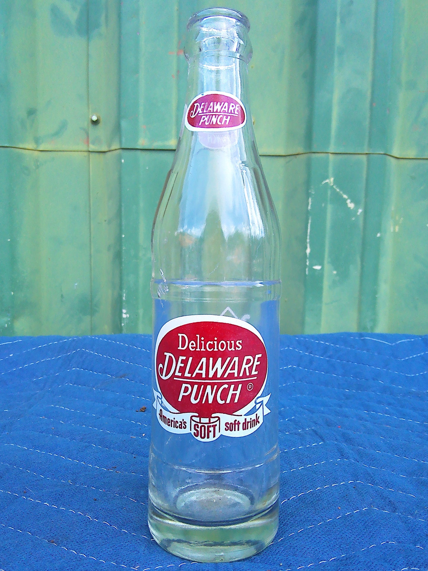 Individual assorted glass soda bottles
