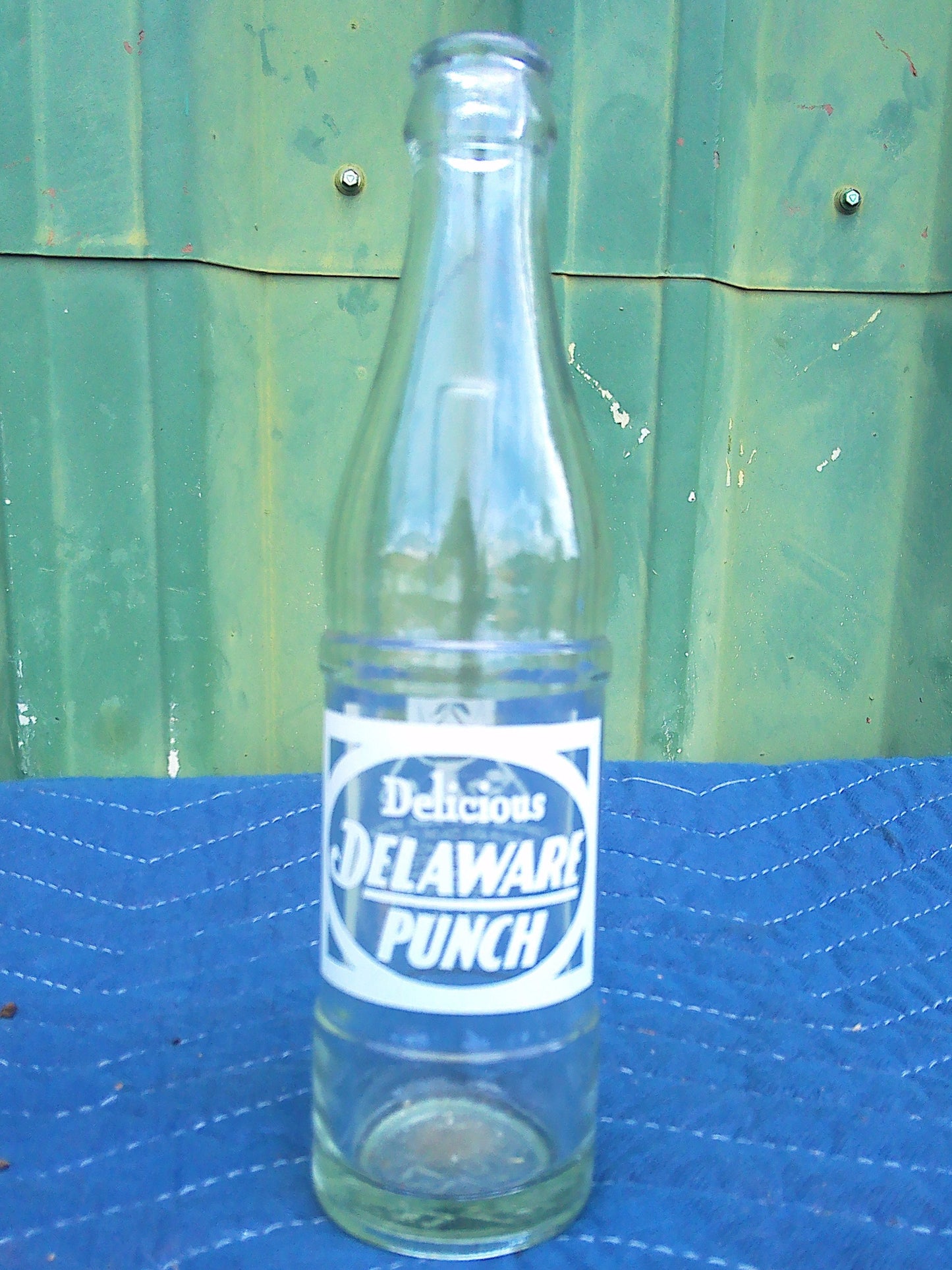 Individual assorted glass soda bottles