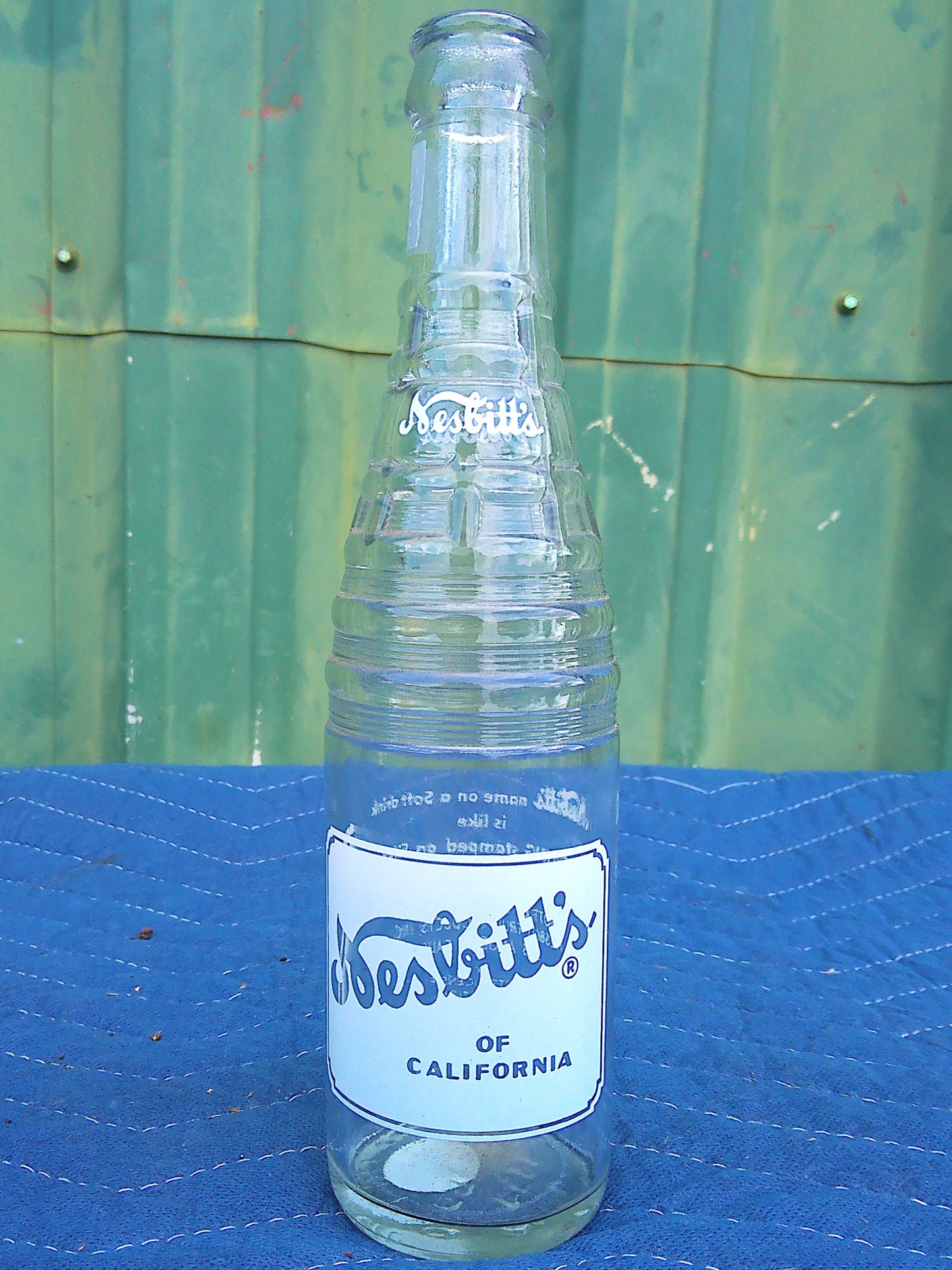 Individual assorted glass soda bottles
