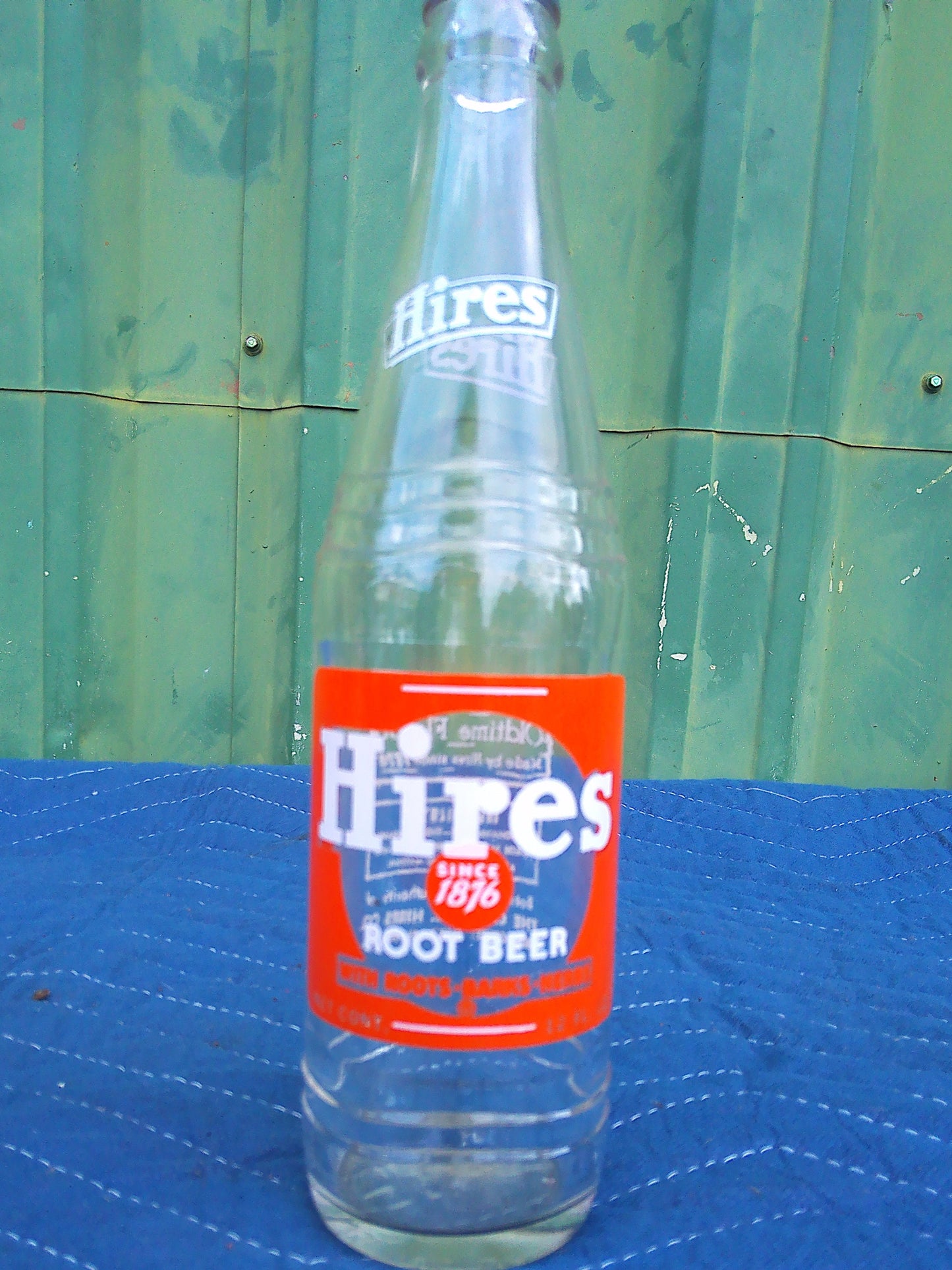 Individual assorted glass soda bottles