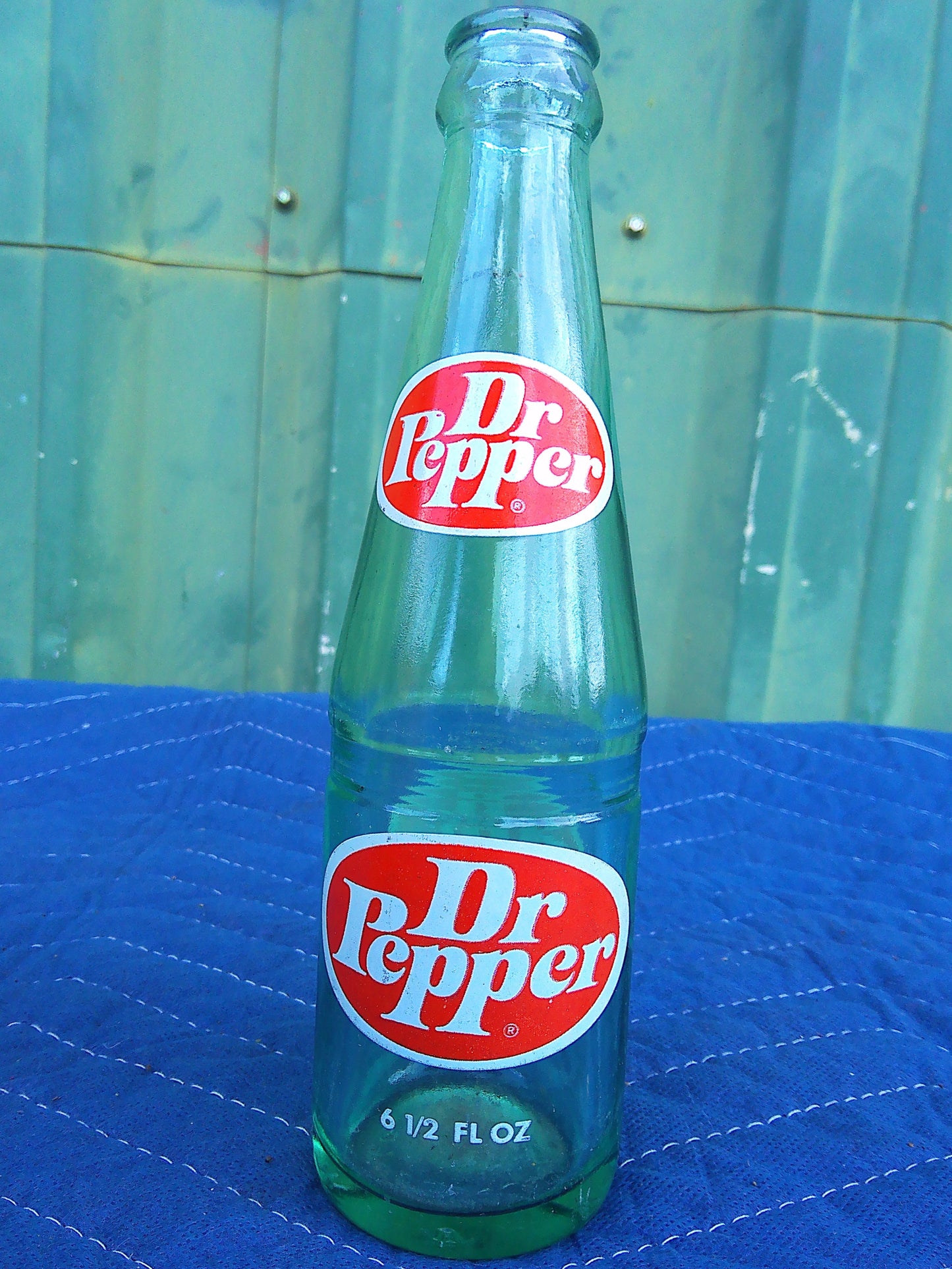 Individual assorted glass soda bottles