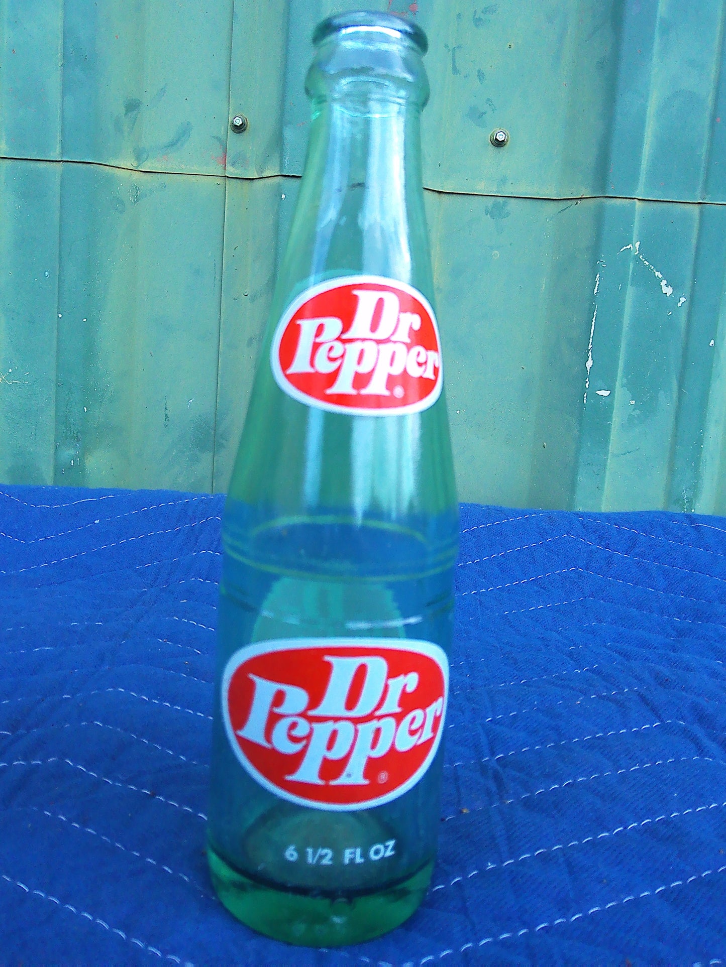Individual assorted glass soda bottles