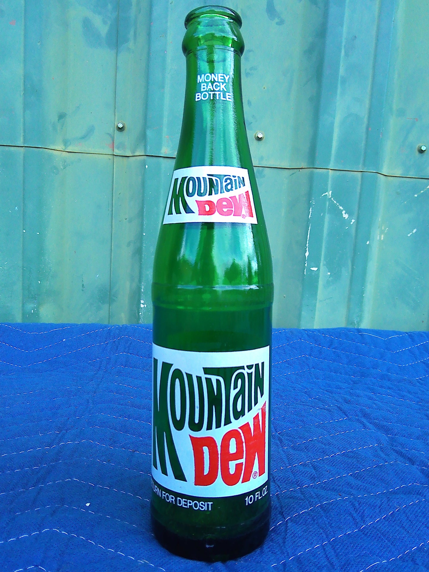 Individual assorted glass soda bottles
