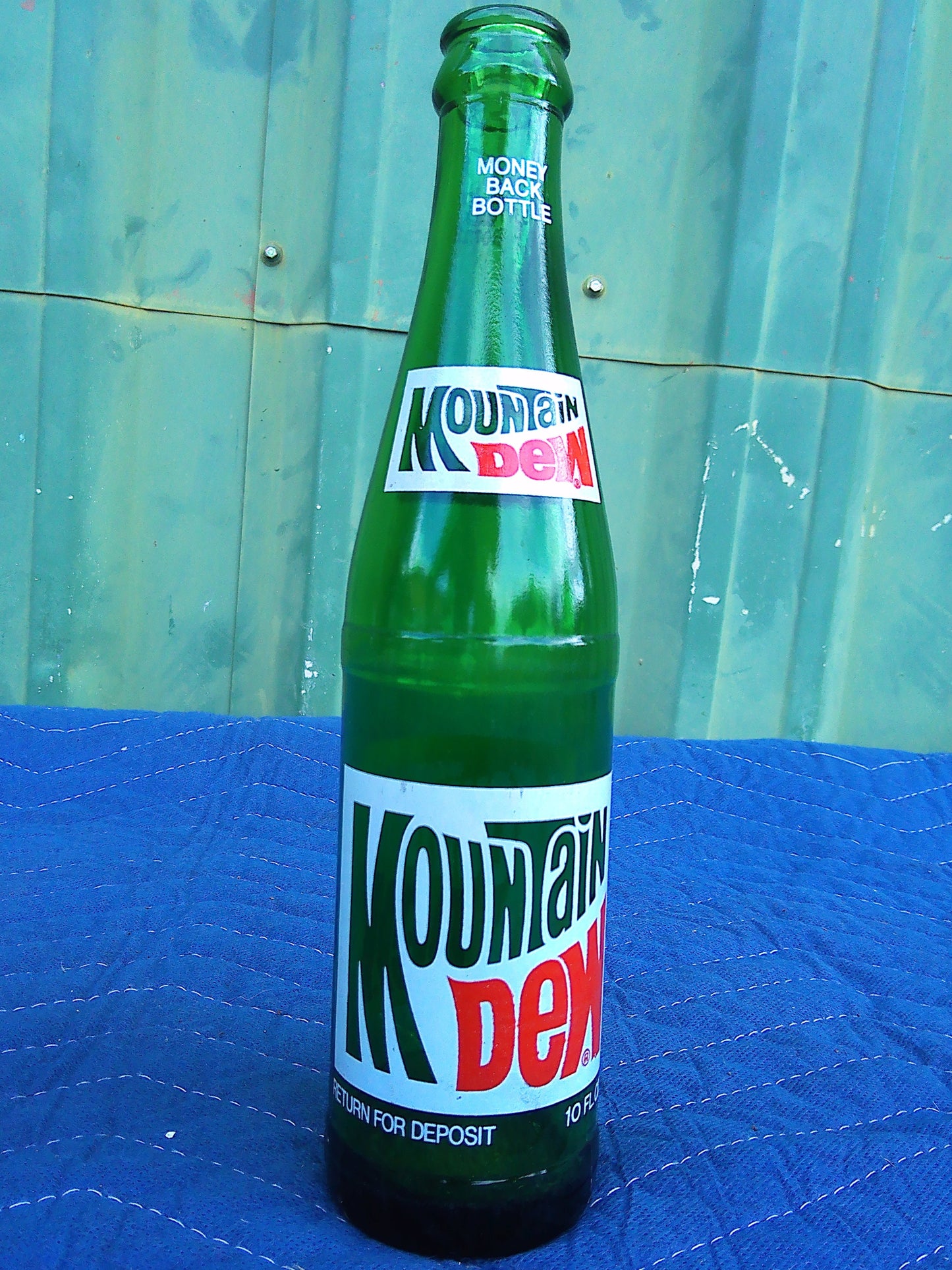Individual assorted glass soda bottles
