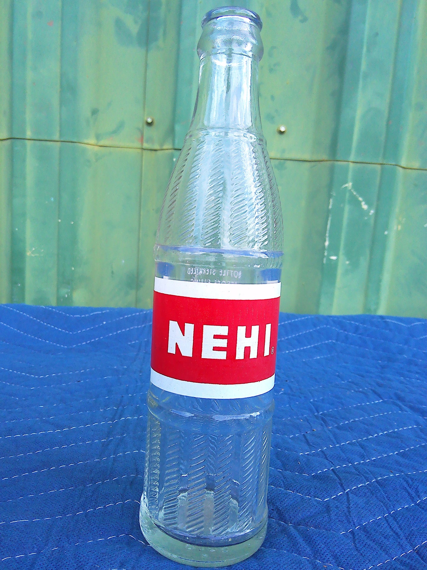 Individual assorted glass soda bottles