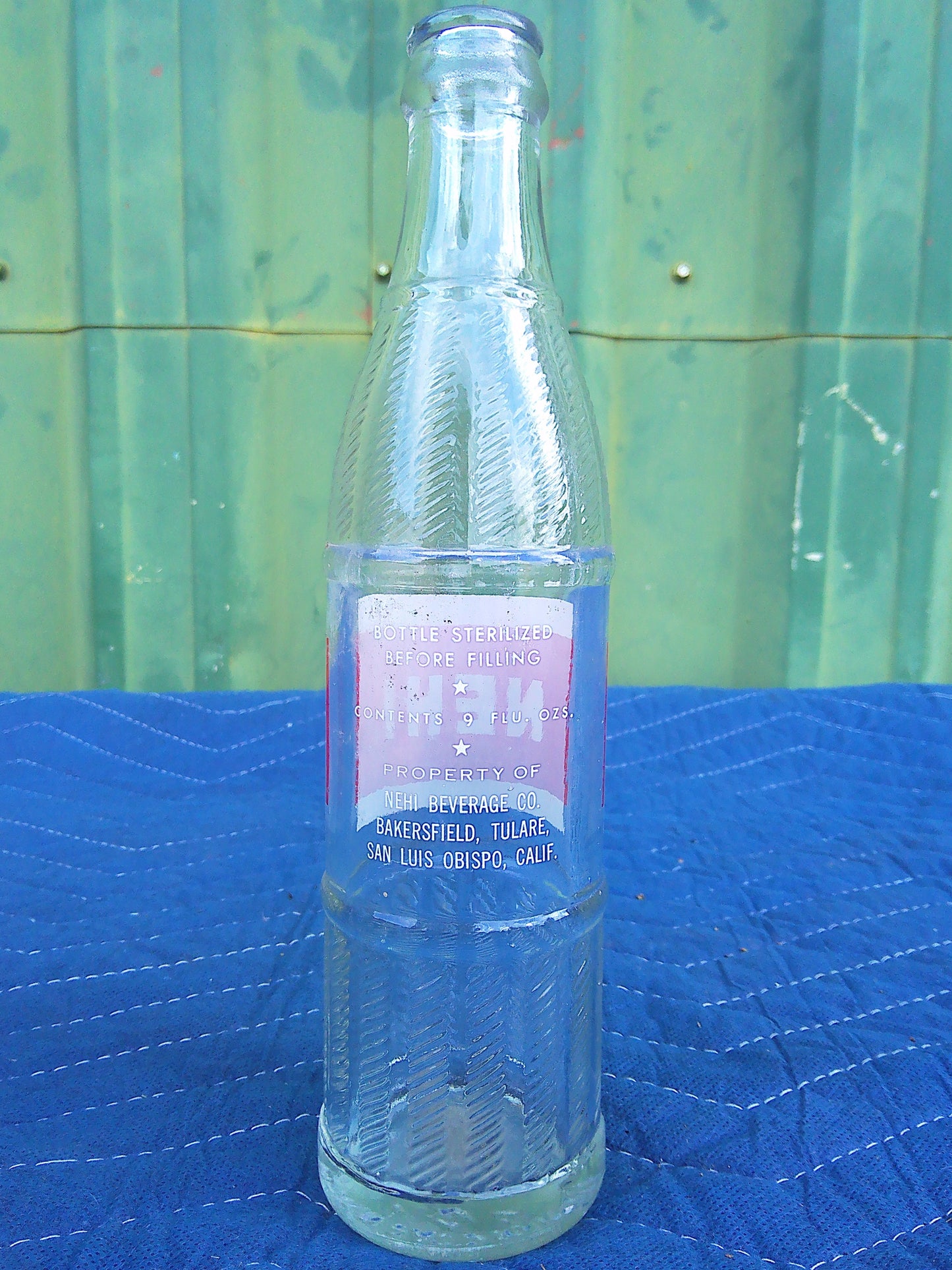Individual assorted glass soda bottles