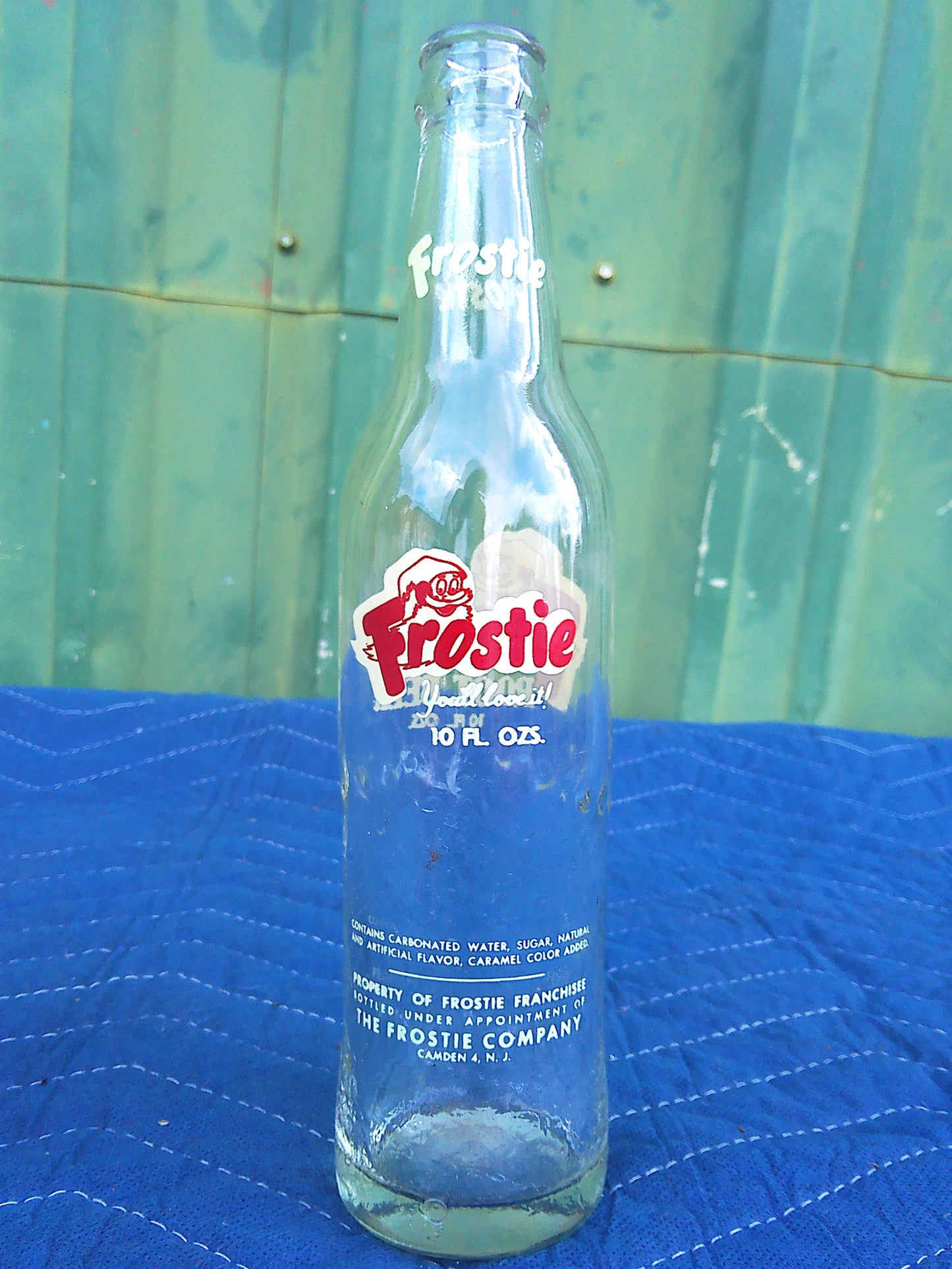 Individual assorted glass soda bottles