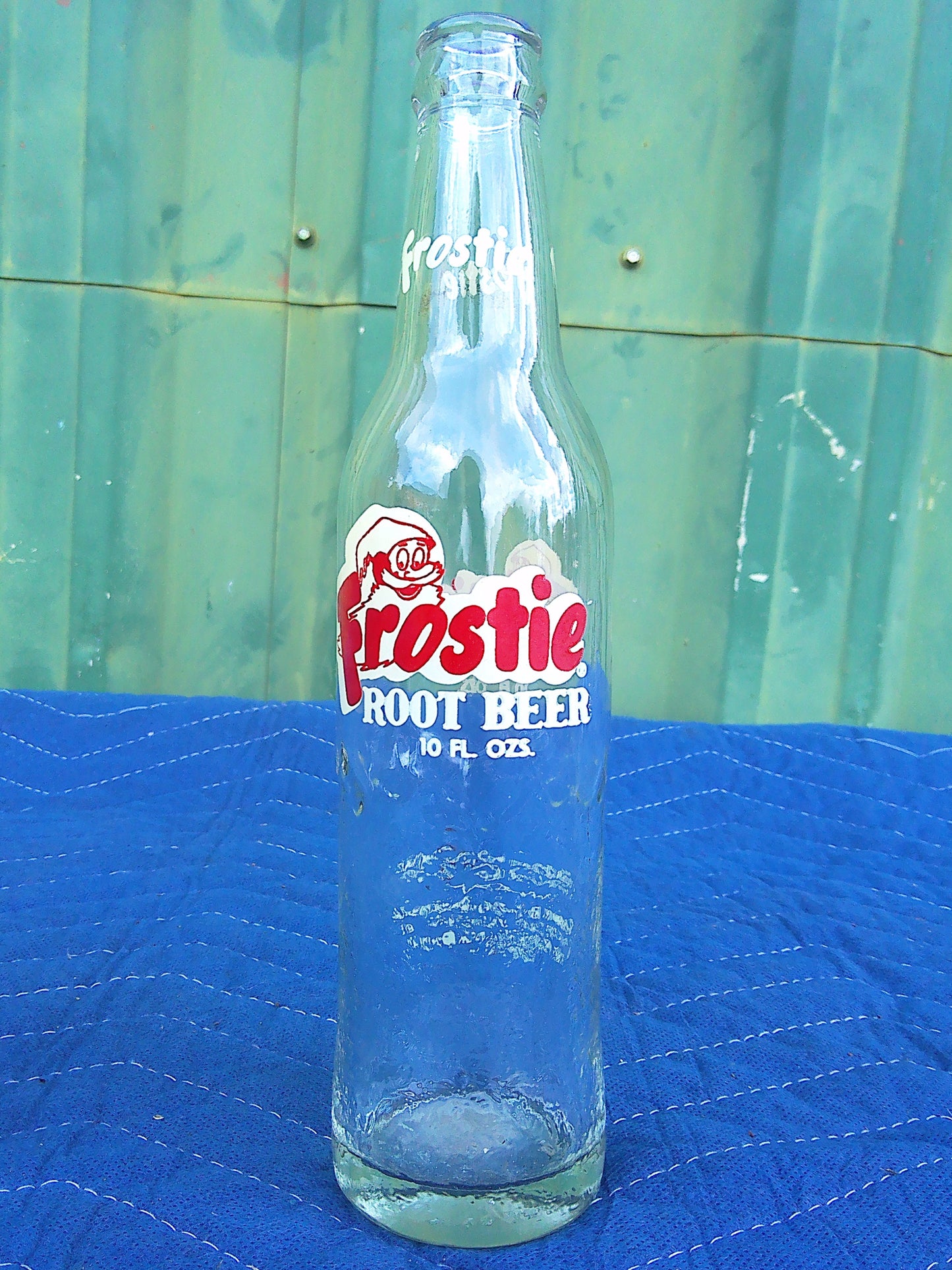 Individual assorted glass soda bottles