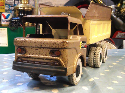 Vintage 1950's Louis Marx & Co Powerhouse Pressed Steel Hydraulic Dump Truck gold/beige
