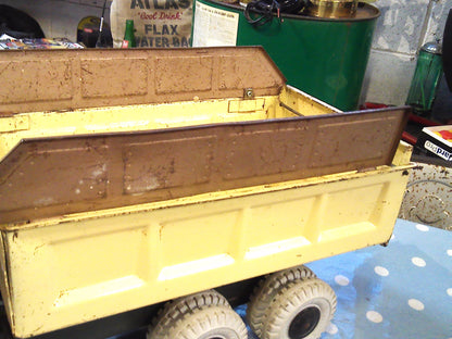 Vintage 1950's Louis Marx & Co Powerhouse Pressed Steel Hydraulic Dump Truck gold/beige