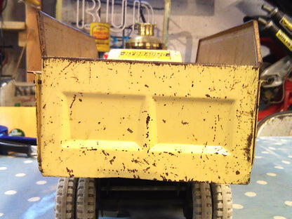 Vintage 1950's Louis Marx & Co Powerhouse Pressed Steel Hydraulic Dump Truck gold/beige