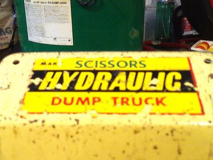 Vintage 1950's Louis Marx & Co Powerhouse Pressed Steel Hydraulic Dump Truck gold/beige