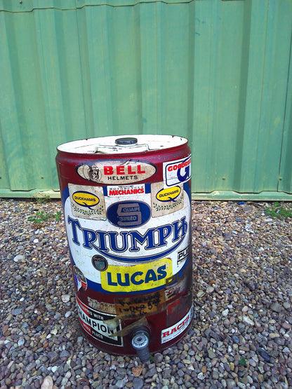 Vintage oil barrel with cool period stickers