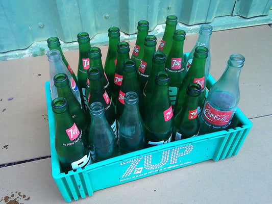 Individual assorted glass soda bottles
