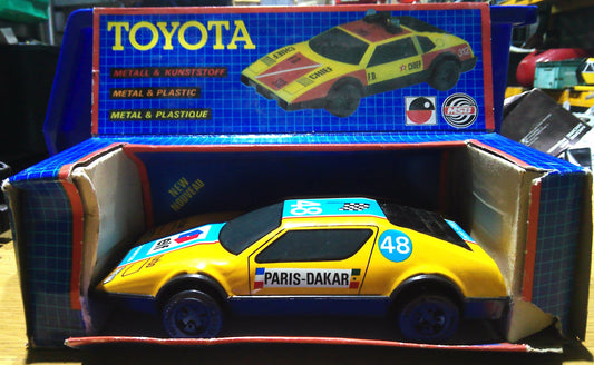 Toyota Friction metal and plastic toy car - Paris-Dakar