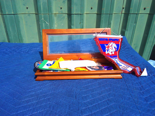 Display case of UK racing memorabilia