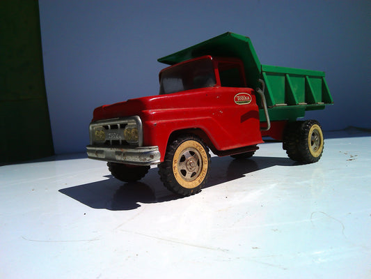 Vintage pressed metal Tonka dump truck toy