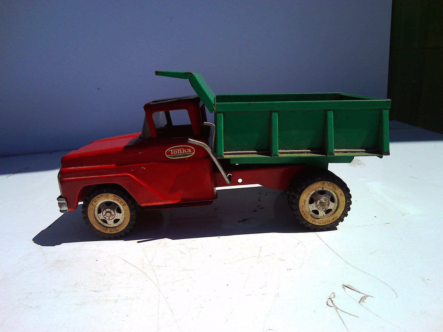 Vintage pressed metal Tonka dump truck toy