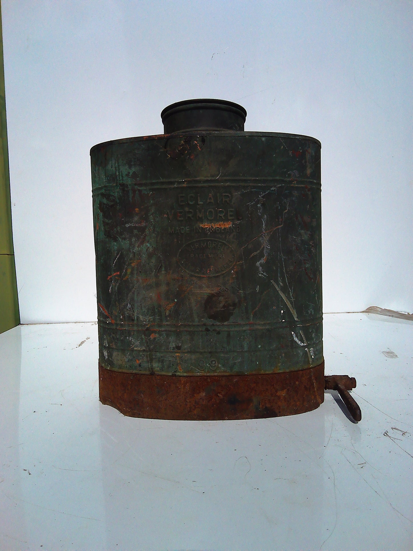 Vintage metal back-carry oil can