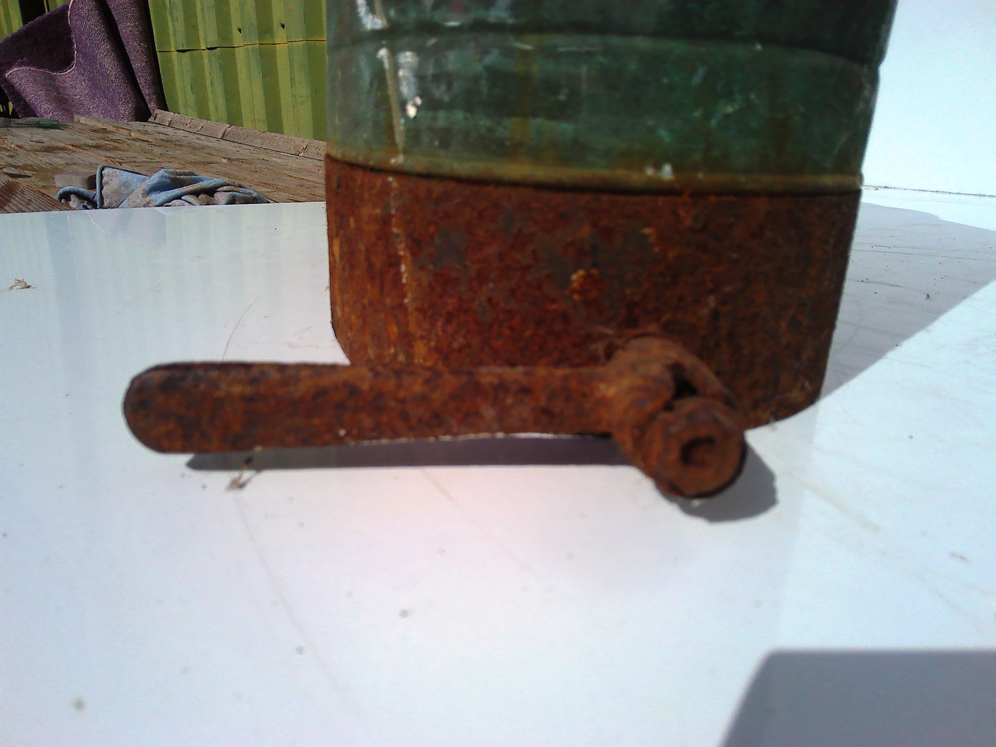 Vintage metal back-carry oil can