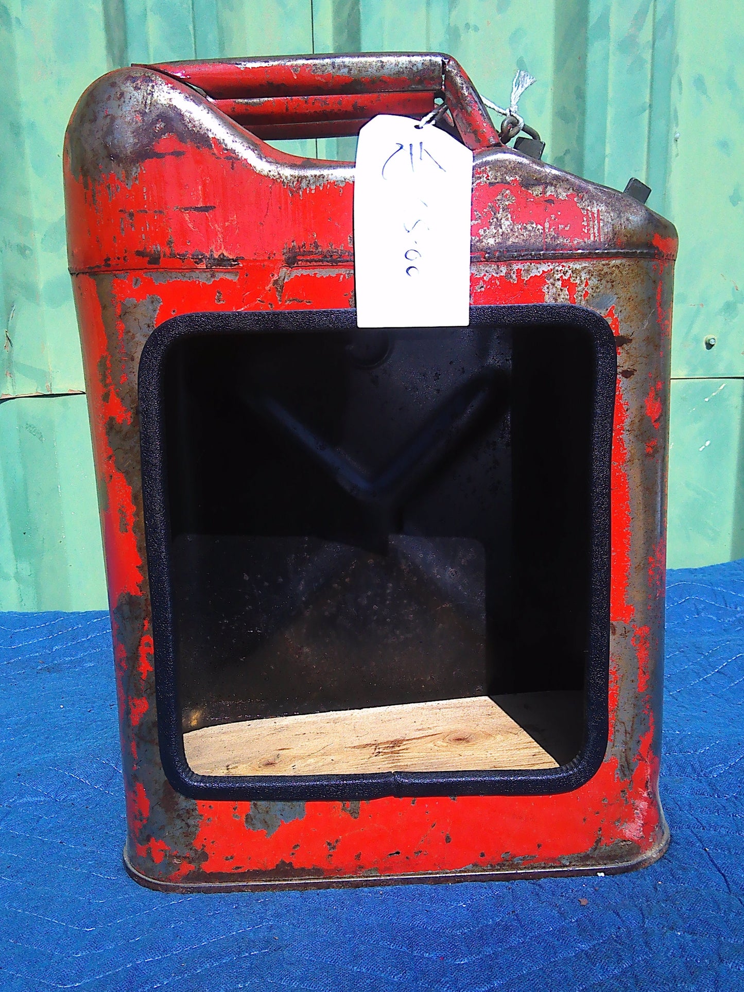Vintage metal oil can turned display case
