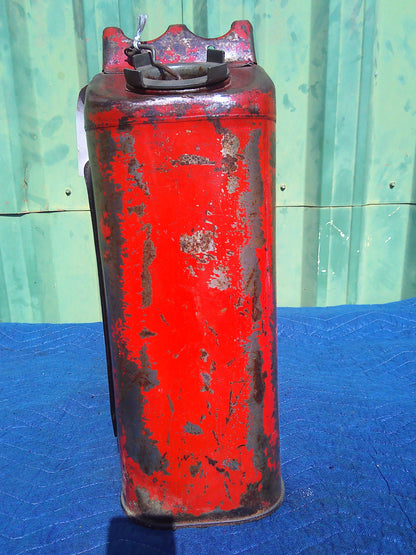 Vintage metal oil can turned display case