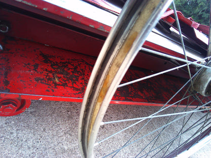 Vintage Raleigh bike with rear wheel dynamo and pouch