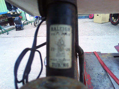 Vintage Raleigh bike with rear wheel dynamo and pouch