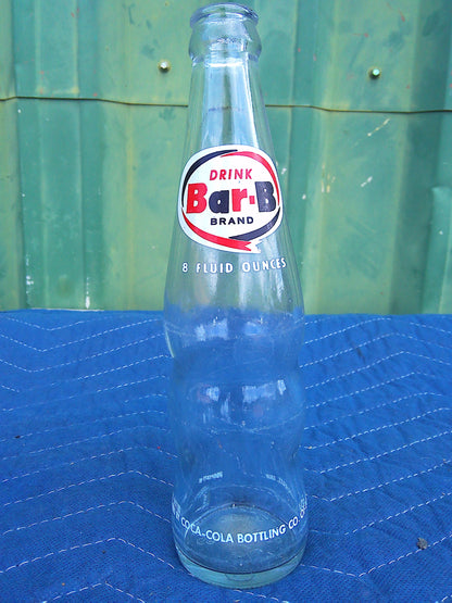 Individual assorted glass soda bottles