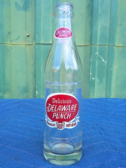 Individual assorted glass soda bottles