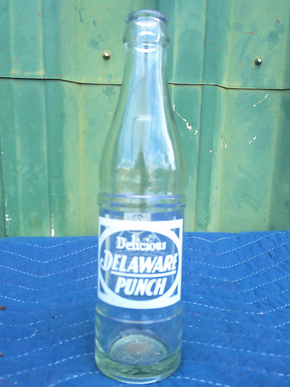 Individual assorted glass soda bottles