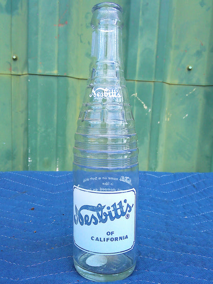 Individual assorted glass soda bottles