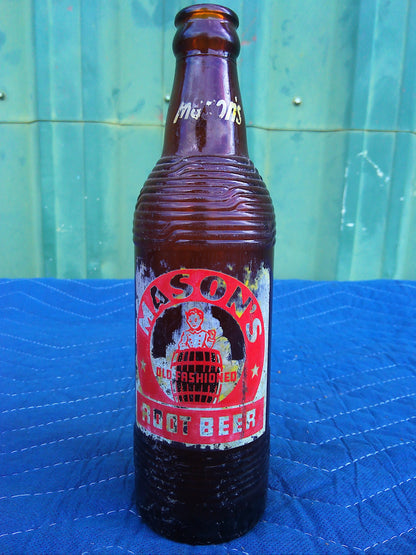 Individual assorted glass soda bottles