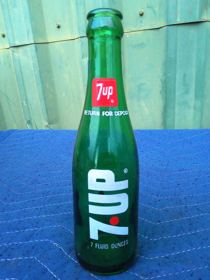 Set of 24 vintage glass 7-Up bottles in wooden crate