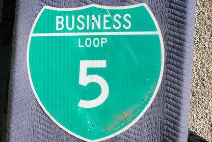 Genuine Business Loop 5 road sign